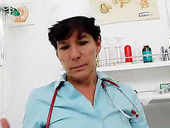 Granny Nurse Gets In The Exam Chair And Looks In Her Pussy