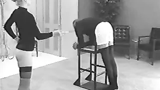 Stunning Glamour Domme Spanks Her Naked Slave